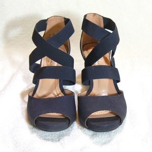 Abellas size 9 elastic strap sandal. 2 inch heel.